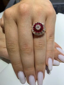 VVS/vs high clarity diamonds set in a 18k Gold Pear Cut Ruby Stone Circle Ring with Baguette and Round Diamonds
