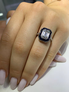 VVS/vs EF color high clarity diamonds set in a 18k Gold Emerald Blue Sapphire Ring with Round Diamonds