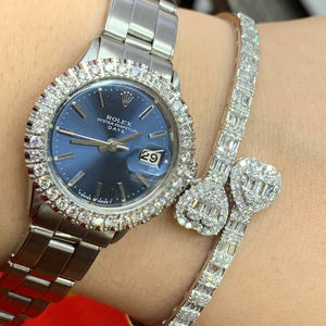 4 piece deal: Ladies`26mm Rolex Diamond Watch with Stainless Steel Oyster Bracelet + White Gold and Diamond Twin Heart Bracelet + White Gold and Diamond Flower Earrings + Gift from Marchello the Jeweler