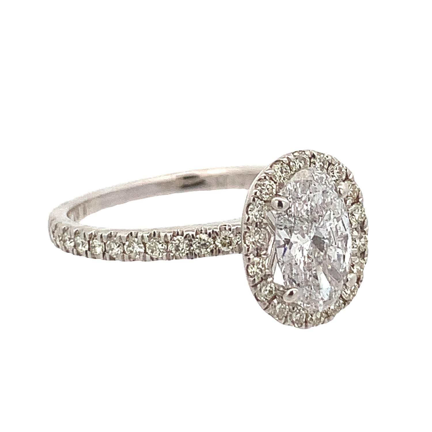 18k White Gold and Diamond Oval Engagement Ring with Oval and Round diamonds