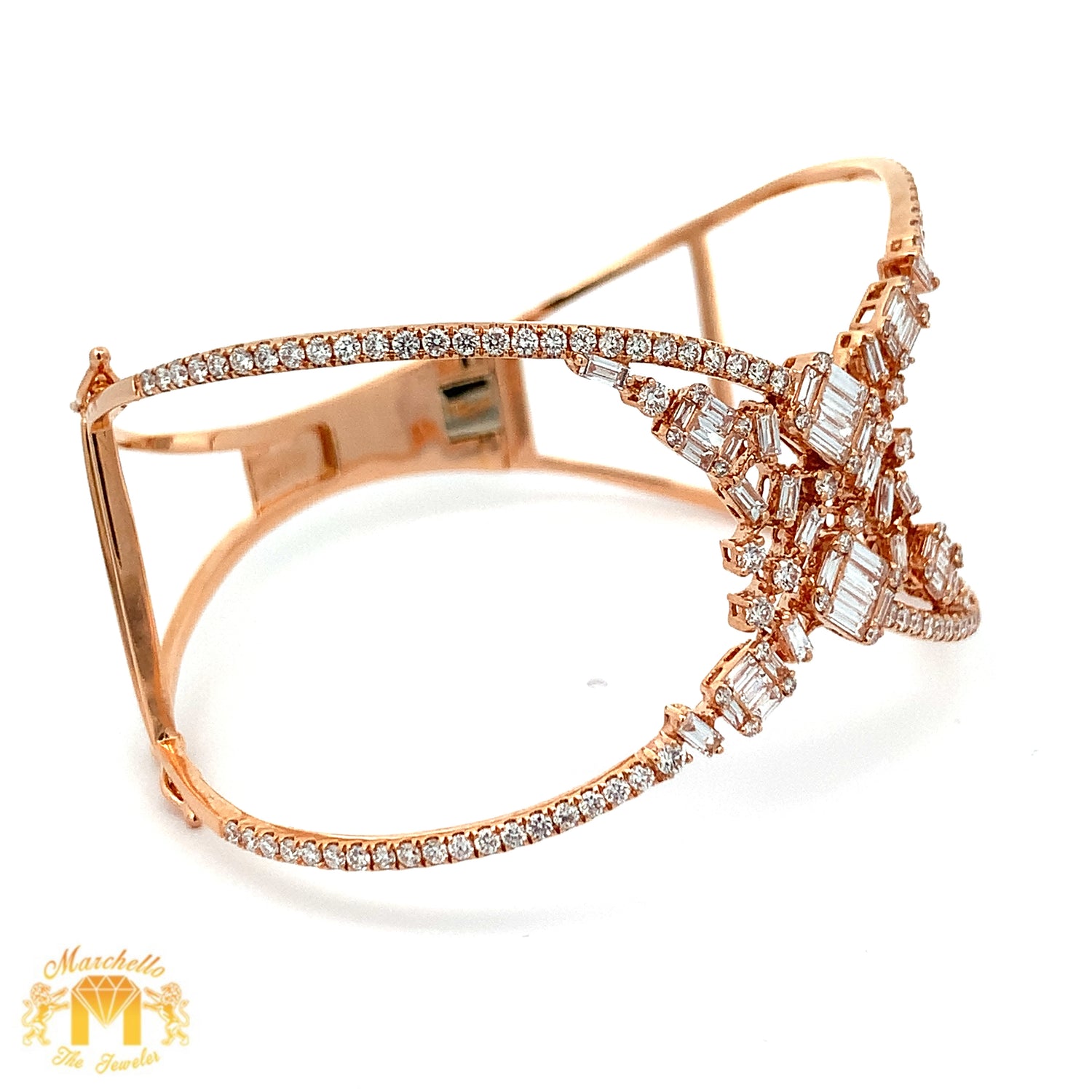 VVS/vs high clarity diamonds set in a 18k Gold Jasimine Bangle Bracelet with Baguette and Round Diamonds