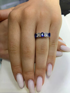 VVS/vs EF color high clarity diamonds set in a 18k Gold Celine Blue Sapphire Ring with Baguette Diamonds