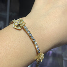 Load image into Gallery viewer, Yellow Gold and Diamond Three Flowers Tennis Bracelet with Round and Baguette diamonds