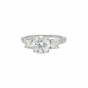 18k White gold three-stone engagement ring Natural diamonds.
