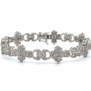 40mm Rolex Watch with Stainless Steel oyster band + White Gold and Diamond Cross Bracelet