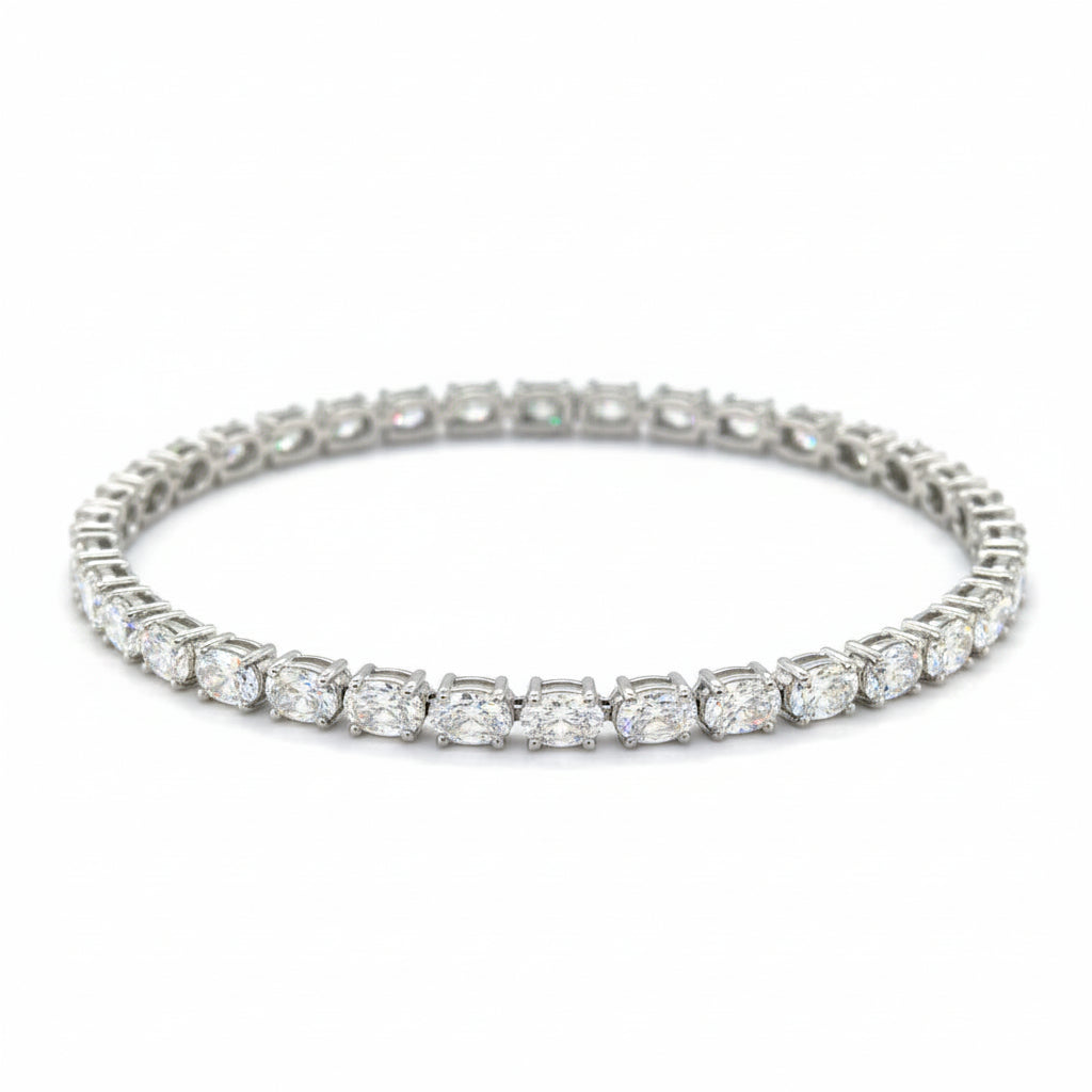 14k white gold and diamond Fancy Bracelet with oval diamond