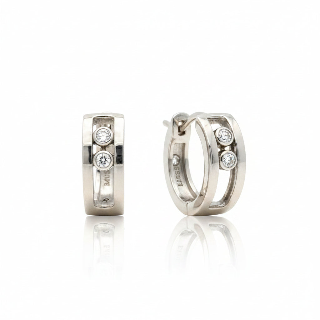 18k white gold and natural diamonds earring.