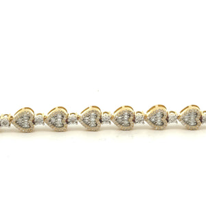 Gold and Diamond Heart & Flower shaped Fancy Link Bracelet with Baguette and Round Diamonds