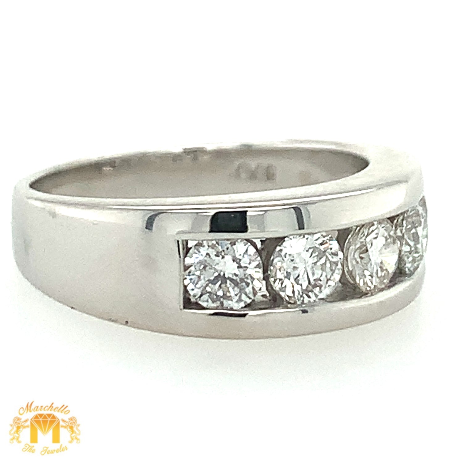 VS/Si high clarity diamonds set in a 14k Gold Wedding Band (channel set, 5 big diamonds)