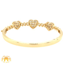 Load image into Gallery viewer, Gold 3 Hearts Cuff Bracelet with natural baguette and round diamonds