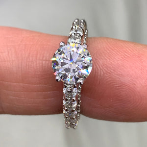 VVS/vs high clarity diamonds set in a 18k White Gold Engagement Ring (GIA certified 1.71ct VVS center diamond)