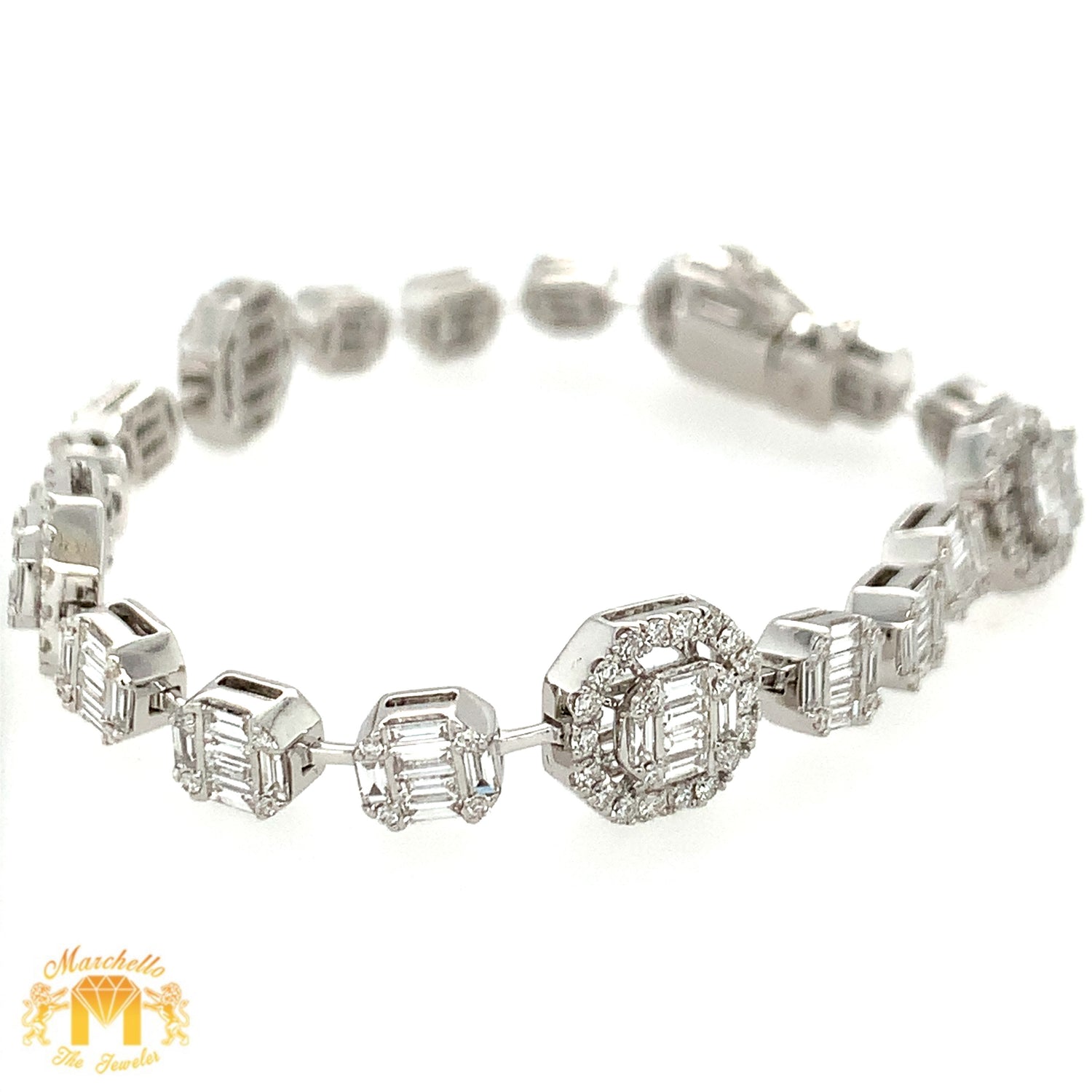 VVS/vs high clarity diamonds set in a 18k White Gold Octagon with a Halo Link Bracelet (VVS baguettes)