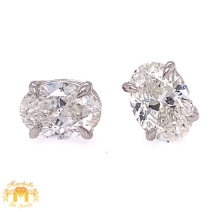 14k White Gold Stud Earrings with Oval Solitaire Diamond