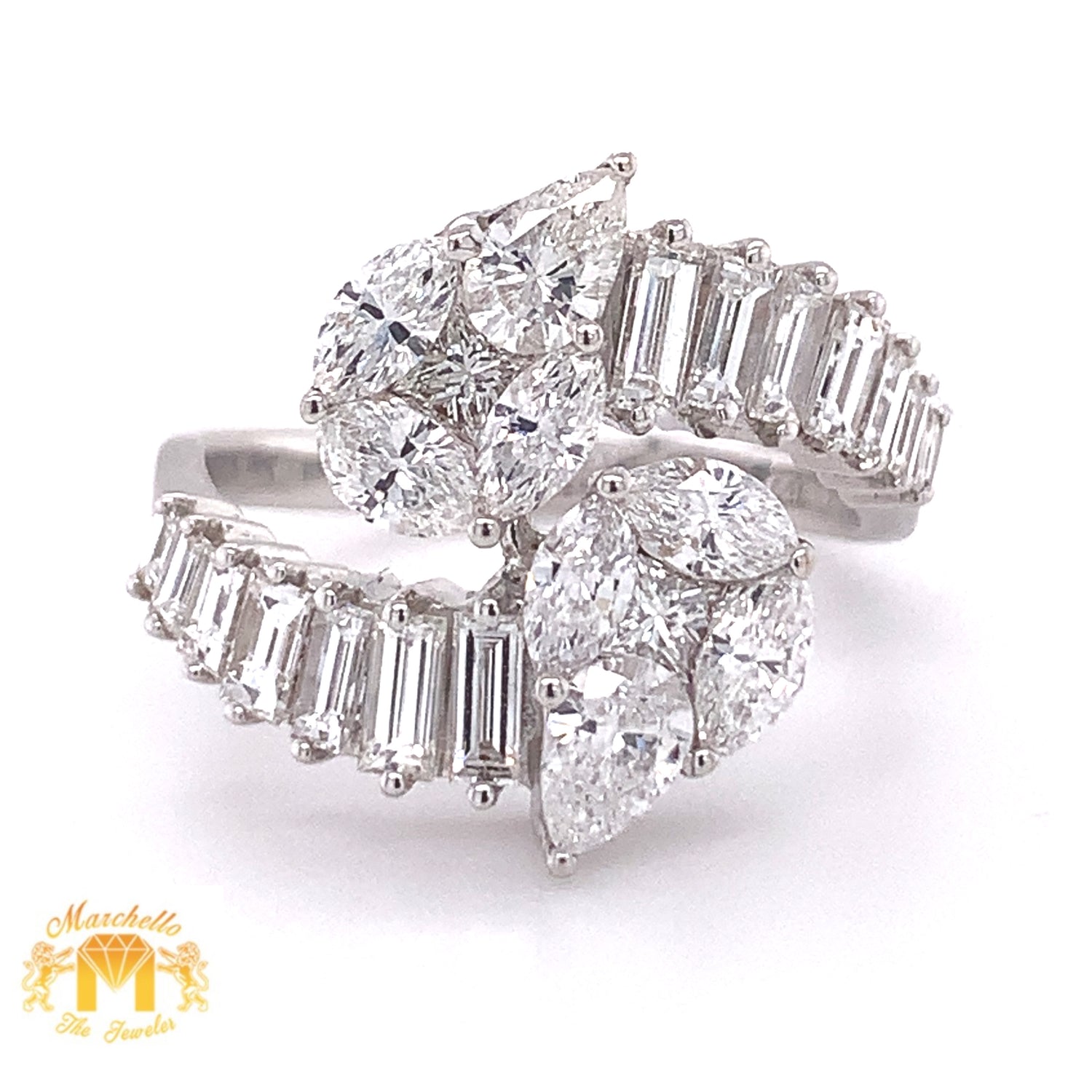 VVS/vs high clarity diamonds set in a 18k White Gold Pear-shaped Twin Ring (jumbo VVS baguettes)