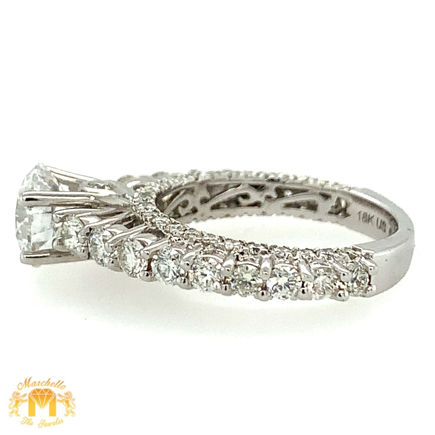 VVS/vs high clarity diamonds set in a 18k White Gold Engagement Ring (GIA certified 1.71ct VVS center diamond)